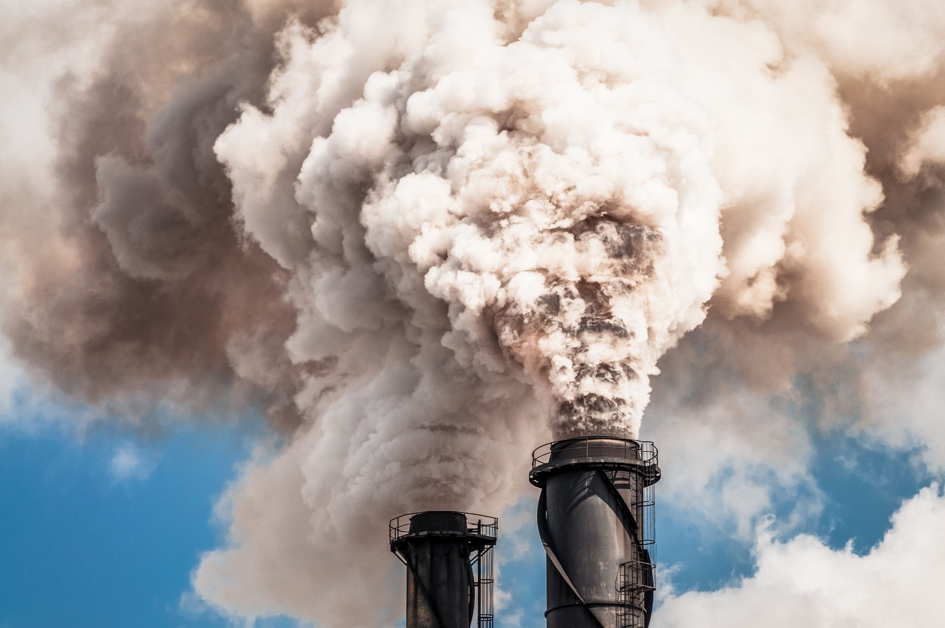 Thick smoke rising from chimneys